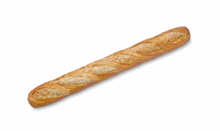 a long loaf of bread on a white surface