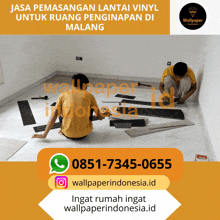 two men are laying vinyl flooring in a room with a phone number