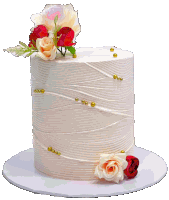 a white cake with flowers and gold beads on top