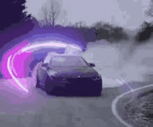 a car is driving down a road with smoke coming out of it and a purple light coming out of it .