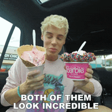 a woman in a car holding two cups of ice cream with the words both of them look incredible on the bottom