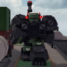 a black and green robot with a triangle on the back