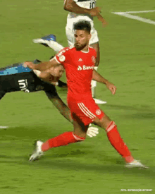 a soccer player wearing a red uniform with the word banri on it