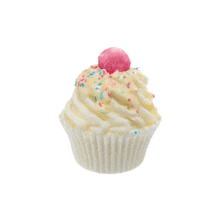 a cupcake with white frosting and sprinkles on top on a white background