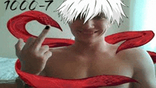 a shirtless man is giving the middle finger while wearing a tokyo ghoul costume .