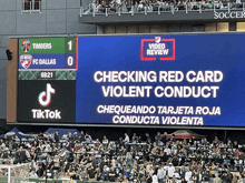 a scoreboard at a soccer game shows the timbers and dallas scores