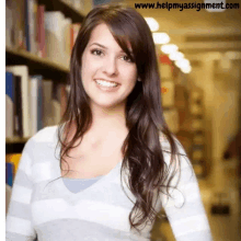 a woman is smiling in a library with the website www.helpmyassignment.com below her