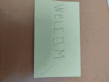 a yellow sticky note that says weldom on it