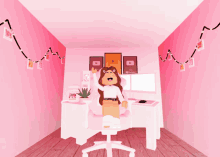 a girl sitting in a pink chair with a youtube logo on the wall