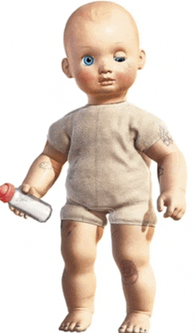 a baby doll with blue eyes and a tattoo on his arm