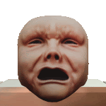 a statue of a baby 's face with a crying expression