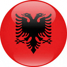 a red button with an eagle on it