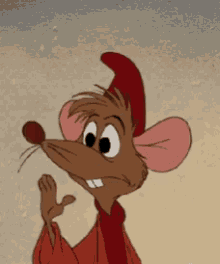 a cartoon mouse wearing a red hat and a red robe