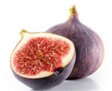 a fig is cut in half on a white background .