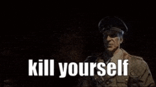 a man in a military uniform is holding a gun and the words `` kill yourself '' are written on a black background .