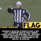 a nfl referee is standing on a field with a sign that says flag on it