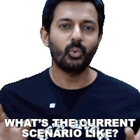 a man with a beard is making a funny face and asking what 's the current scenario like