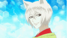 a person with white hair and cat ears is smiling