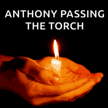 a poster for anthony passing the torch shows a person holding a lit candle