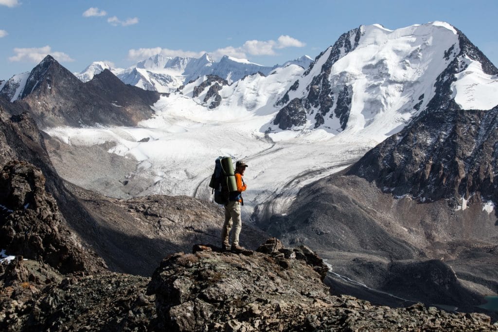 Trekker atop Alakol Pass