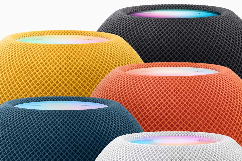 HomePod mini collection showing off the new midnight color