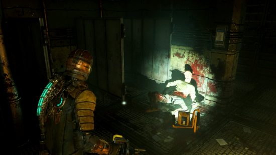 Dead Space remake review: an image of Isaac Clarke and a corpse in the horror video game