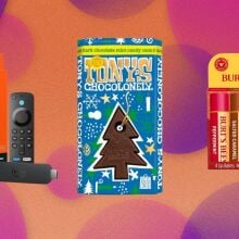 A bar of Tony's Chocolonely appears centrally, next to a four pack of holiday flavored Burt's Bees lip balm and an Amazon Fire TV Stick.