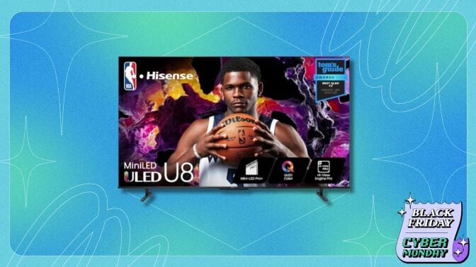 a Hisense TV displays a basketball player holding the ball with both hands at chest level while looking directly out of the TV