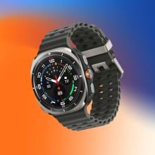 Samsung Galaxy smartwatch on blue and orange background