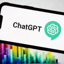 In this photo illustration, the Chat GPT logo seen displayed on a smartphone