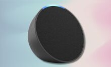 charcoal amazon echo pop on a light blue and light pink gradient background