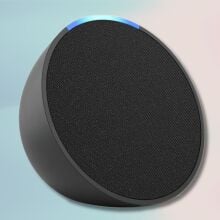 charcoal amazon echo pop on a light blue and light pink gradient background