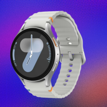 Samsung Galaxy Watch 7 on red, blue, and orange abstract background