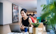 Young Asian businesswoman working in a modern office space