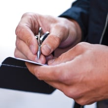 man writing with inkless ForeverPen 