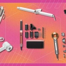 pink and orange gradient background with various beauty tools including t3 curling wand, zuvi halo hair dryer, and dyson airwrap