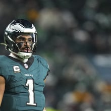 Jalen Hurts of the Philadelphia Eagles looks on