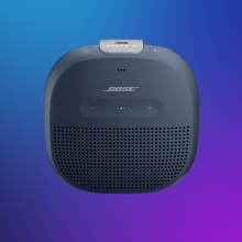 Bose SoundLink Micro on a purple gradient background