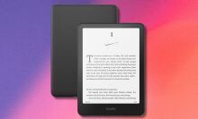 amazon kindle paperwhite on a purple, pink, and orange gradient background