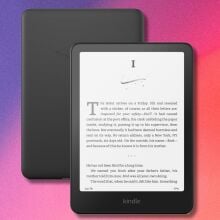 amazon kindle paperwhite on a purple, pink, and orange gradient background