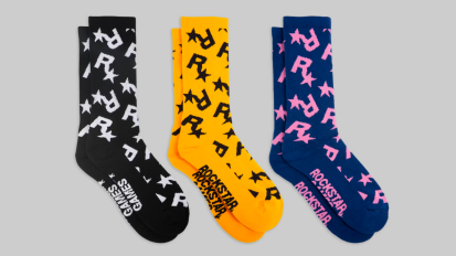 three pairs of socks with the rockstar games logo on them