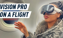 woman wearing the apple vision pro on a plane