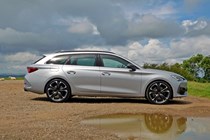 Best estate cars 2024: Cupra Leon Estate, side view static, silver paint, gravel car park