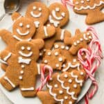 Vegan Gingerbread Cookies on a Plate with Candy Canes.