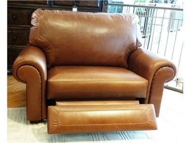 tan leather chair and a half