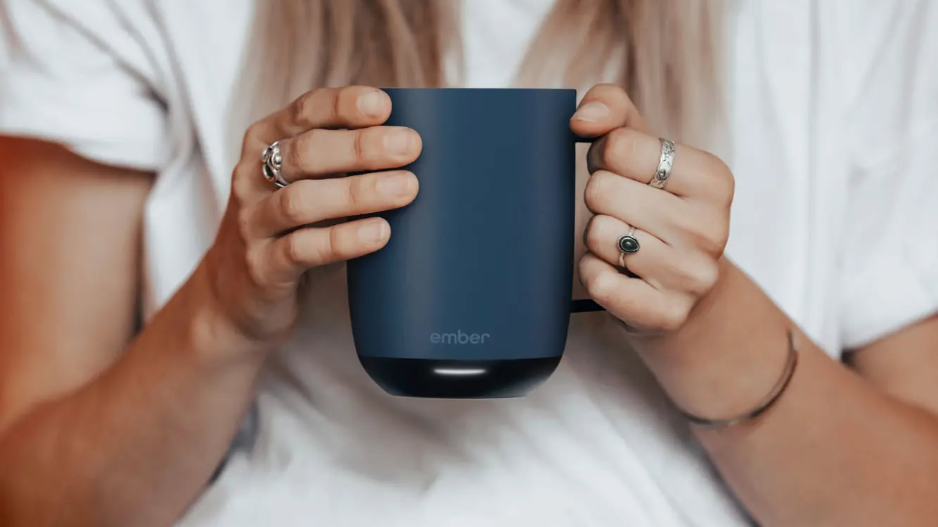 Ember Mug 2 in blue in hands