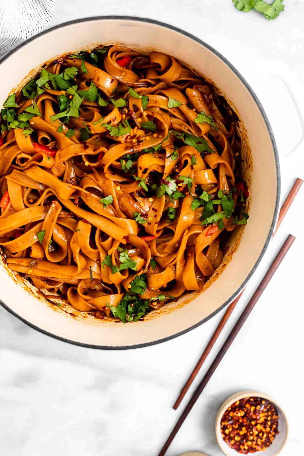 chili garlic noodles in a large white pot