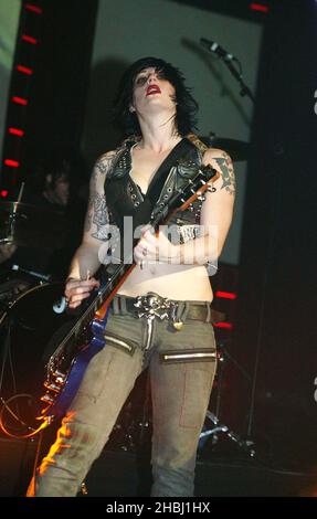 Brody Dalle from The Distillers perform on stage at the Carling Brixton Academy in London. The gig is part of a series of performances ahead of the NME Awards. Stock Photo