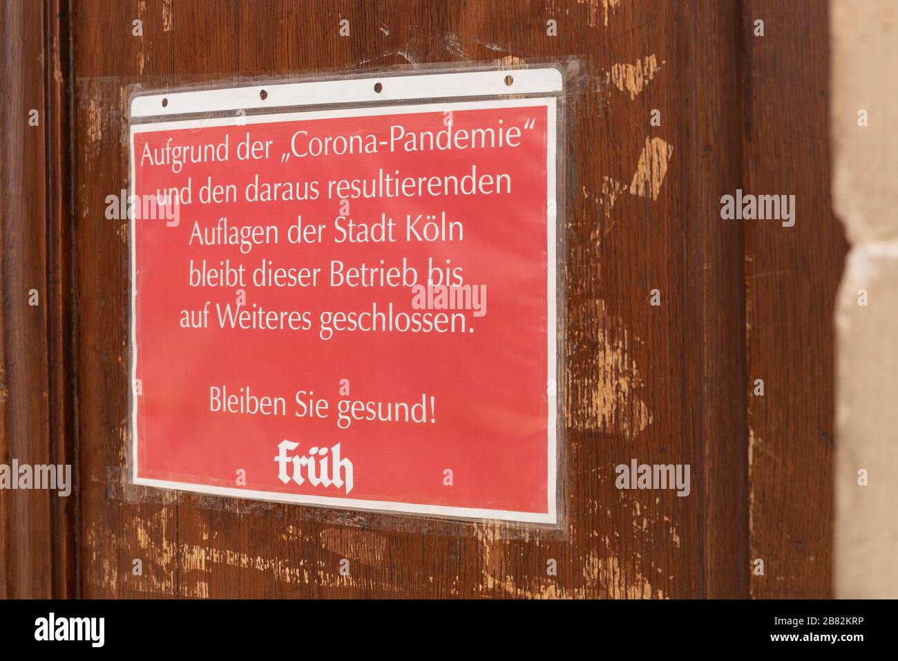 Sign at a pub that it has closed because of the Corona crisis and the requirements of the city of Cologne Stock Photo