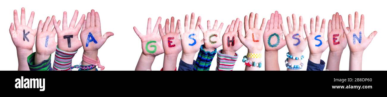 Hands Building KITA geschlossen Means Kindergarden Closed, Isolated Background Stock Photo